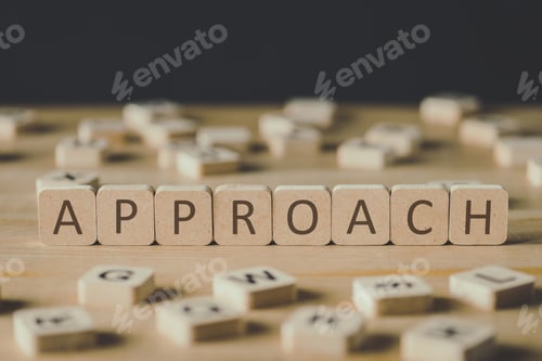 Preview: selective focus of word approach made of cubes surrounded by blocks with letters on wooden surface