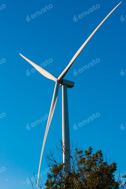 Preview: Wind turbine energy converter blue sky Local eco friendly wind farm. Green ecological electricity.