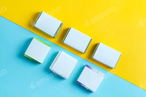 Preview: Handmade herbal natural soap bar in pack, mock-up paper label on a duotone blue yellow background