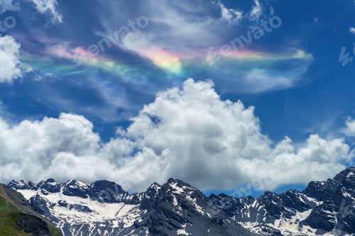 Preview: Iridescent cloud over the road to Stelvio pass (Lombardy) at summer