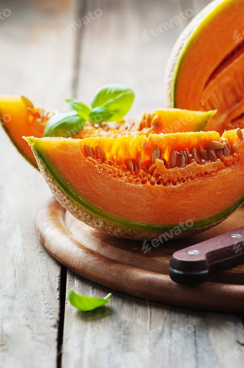 Preview: Sweet fresh melon on the wooden table