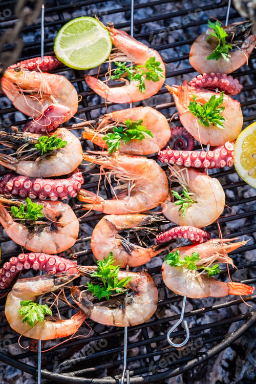 Preview: Grilling fresh seafood skewers with lemon and parsley