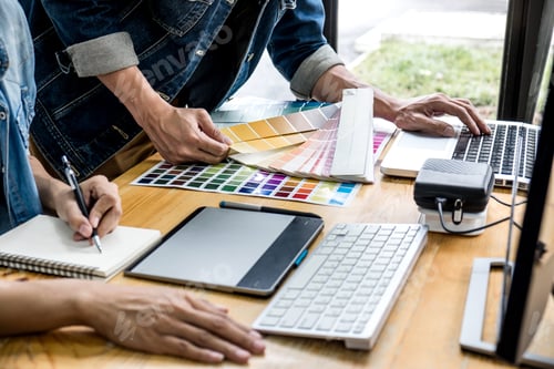 Preview: Young creative team having a meeting in creative office