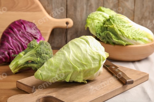 Preview: Different fresh cabbages on table. Healthy food