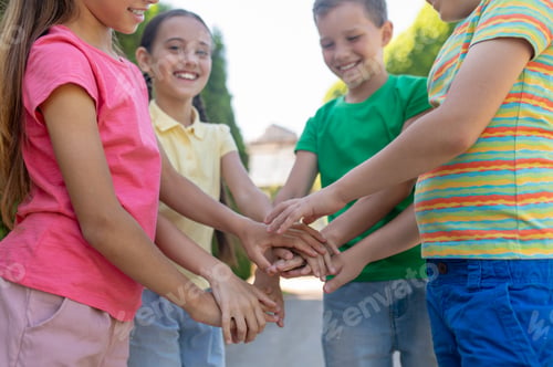 Preview: Boys and girls outstretched arms as sign of friendship