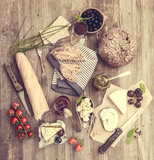 Preview: French snacks on a wooden background