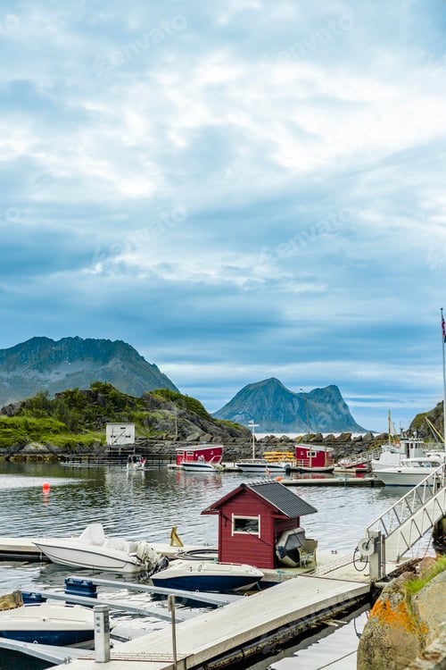 Preview: Idyllic Scandinavian seaside with colorful houses and boats
