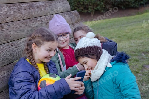 Preview: four teenage girls play outdoors, early spring in europe, generation 3, new normal