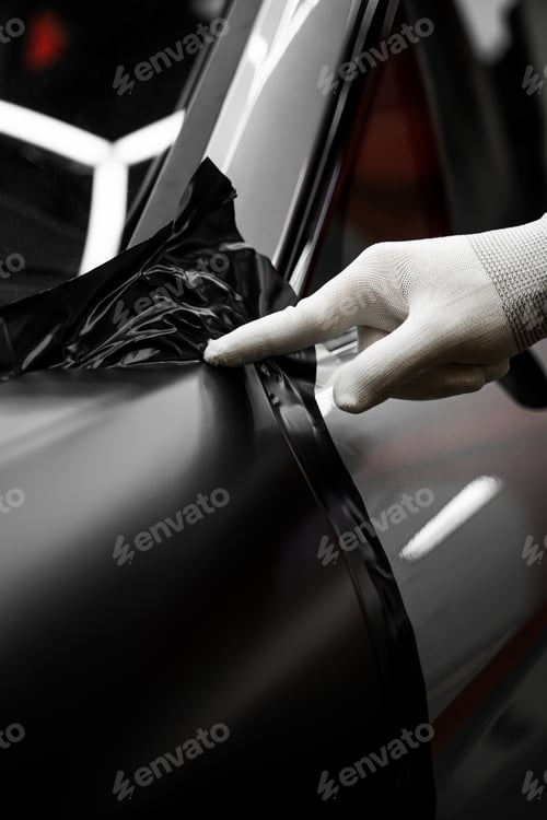 Preview: Applying vinyl wrap to full car panels transforms exterior aesthetics