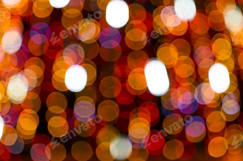 Preview: Beautiful bright multi-colored lights in the dark. Abstract festive background blurred circles.