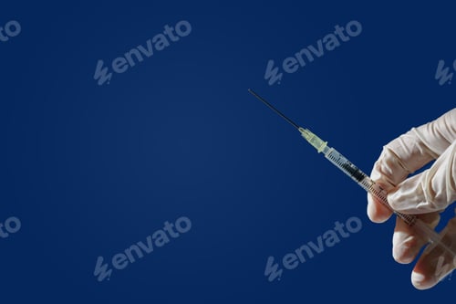 Preview: Insulin syringe in hand