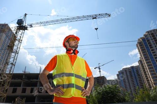 Preview: Young man civil engineer in safety hat