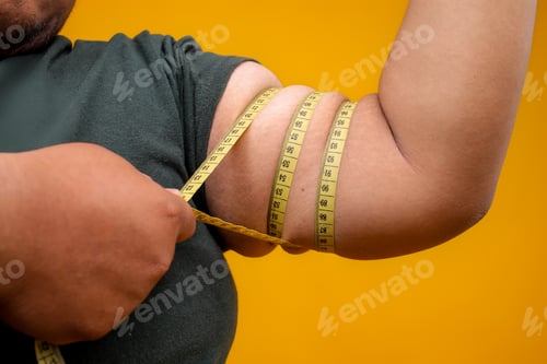 Preview: Person Measuring Upper Arm with Flexible Tape Measurement Isolated on Yellow Background