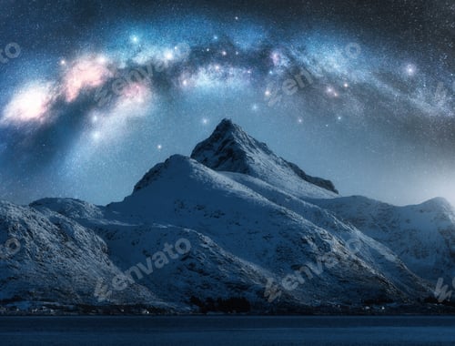 Preview: Milky Way and beautiful snowy mountain at winter starry night