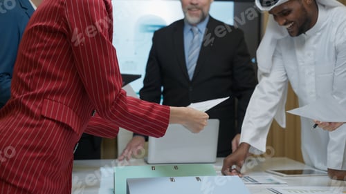 Preview: Business officer team consulting together with new project
