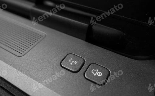 Preview: Close-up image of function buttons on laptop. Wireless, mute, technology, computer, device, gadget.