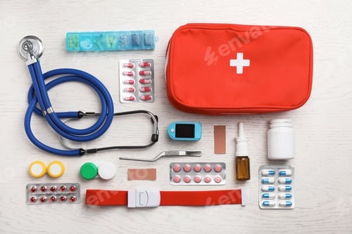 Preview: Flat lay composition with medical objects on white wooden background
