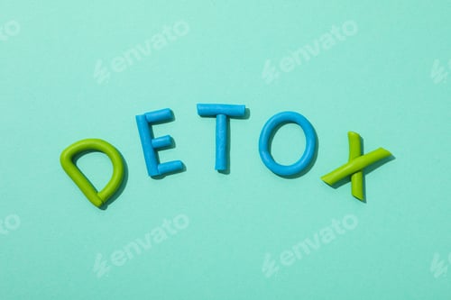 Preview: The word "detox" is made of colored plasticine on a turquoise background.