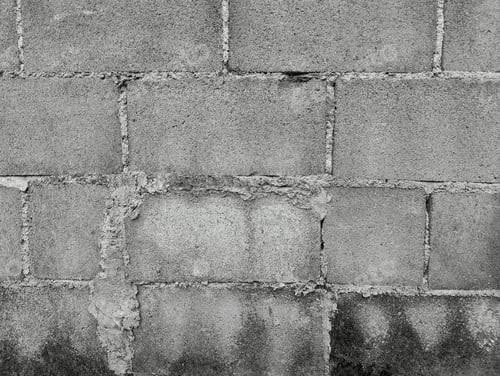 Preview: Close-up of White cement crack block wall and peeled paint caused by water and sunlight.