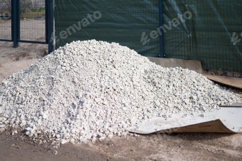 Preview: A pile of construction material at the building. White gravel for construction works