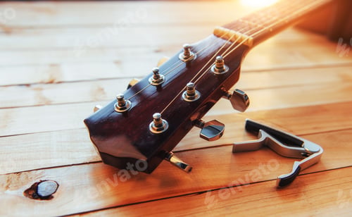 Preview: close up neck acoustic classical guitar on a light wooden background