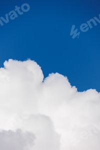 Preview: white cumulus clouds in blue sky, beautiful view of the sky and storm clouds. Huge majestic cloud