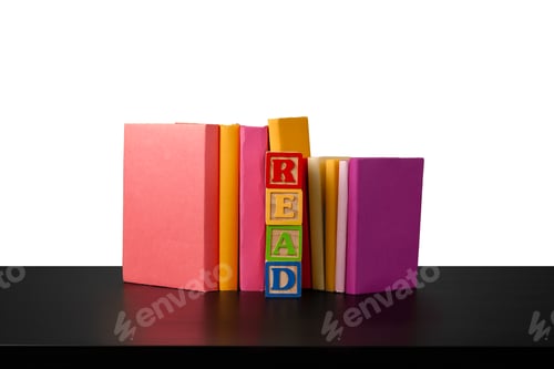 Preview: Stack of books on wooden table against white background