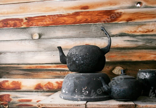 Preview: black pot and teapot in the shed
