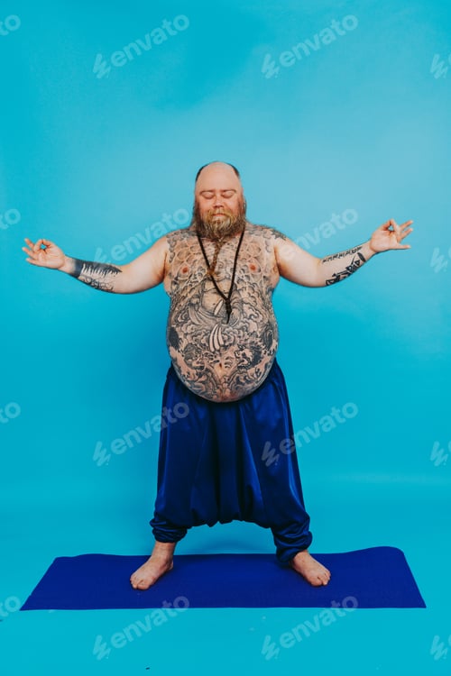 Preview: Funny fat man doing yoga meditation