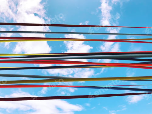 Preview: Colorful lines / ribbons against partly cloudy blue sky