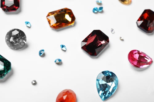Preview: Different beautiful bright gemstones on white background