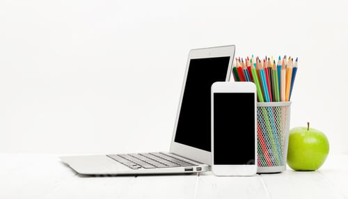 Preview: Workplace with laptop, smartphone, supplies