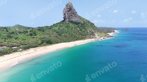 Preview: Aerial view of a beach and rocky hill in Fernando de Noronha, Brazil.