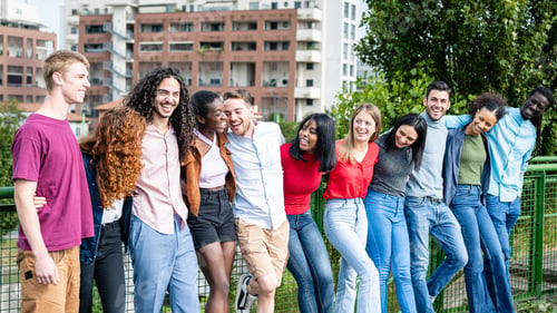 Preview: Happy group of multiracial young friends, diverse people smiling at camera outside