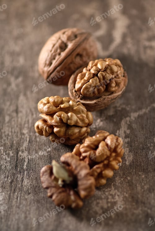 Preview: Walnuts in closeup on wooden background