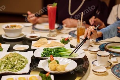 Preview: People Eating Chinese Food In The Restaurant