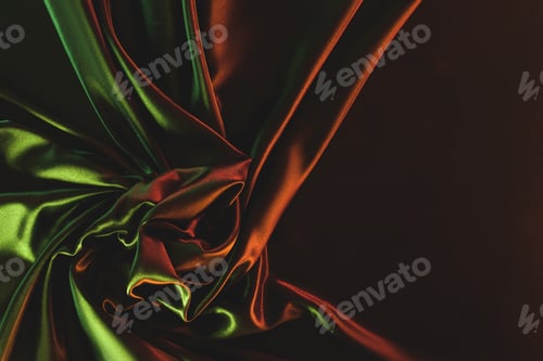Preview: close up view of dark green crumpled silk cloth as backdrop