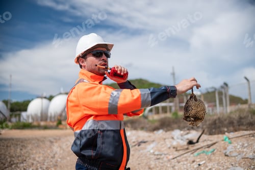 Preview: Environmental engineer or workers examining waste water