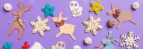 Preview: Banner Festive decorations and toys on purple background. Merry Christmas concept