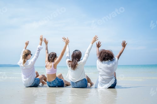 Preview: Group of happy friends having fun on beach summer holiday,Outdoors.