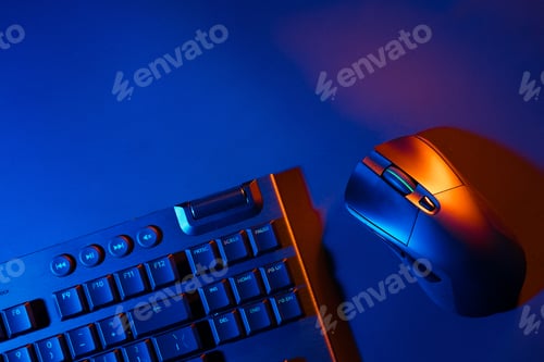 Preview: Computer keyboard and mouse on black background