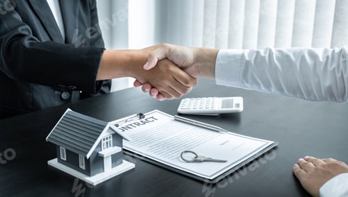 Preview: Broker and client shaking hands after signing contract approved application form