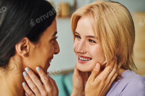 Preview: Intimate moment between two women at home