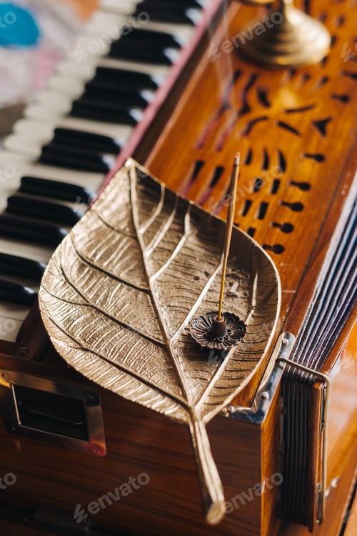 Preview: harmonium during the practice of kundalini yoga and the incense standing on it