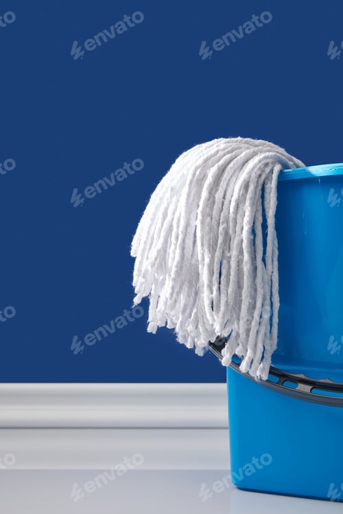 Preview: rag and blue bucket for spring cleaning