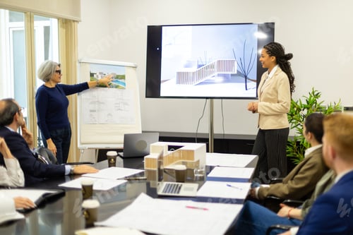 Preview: Architecture team presenting building project to colleagues