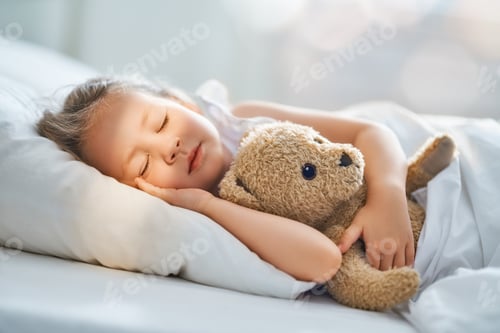 Preview: child is sleeping in the bed