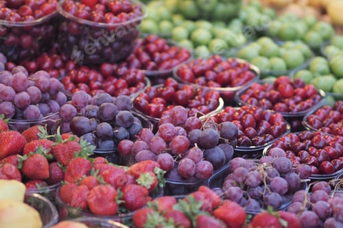 Preview: Fresh fruits displayed in colorful market baskets