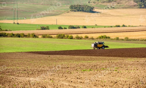 Preview: Tractor plowing the field