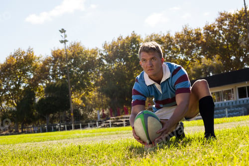 Preview: Man getting ready to kick for goal